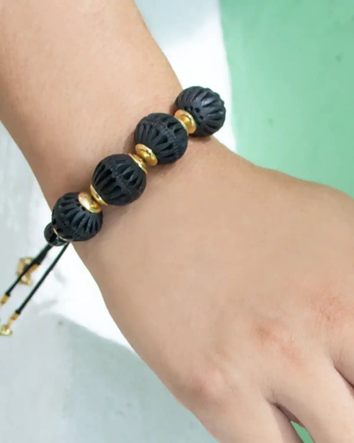 PULSERA ESFERAS MOTAS