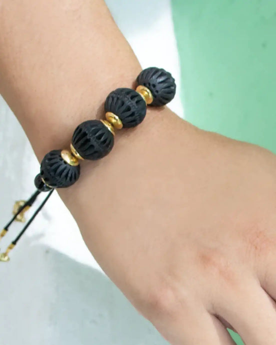 PULSERA ESFERAS MOTAS
