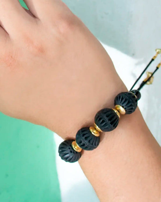 PULSERA ESFERAS MOTAS