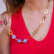 COLLAR LARGO ESFERAS LATERAL
