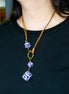 COLLAR LARGO BROCHE CIRCULO Y CUBOS