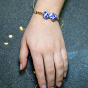 PULSERA 2 CUBOS TALAVERA Y CUBITOS DORADOS