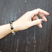 PULSERA ONIX CON TALAVERA NEGRA