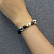 PULSERA ONIX CON TALAVERA NEGRA